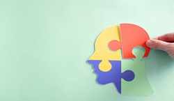 Neurodiversity puzzle of brain on paper
