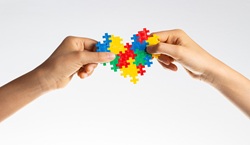 Autism concept heart held by hands