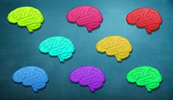 Colourful brains on green background