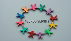 Wooden people holding hands in circle with word 'Neurodiversity' in the centre